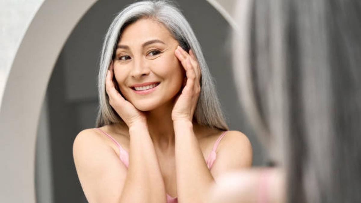 Mujer sonriente tras tratamiento de neuromoduladores